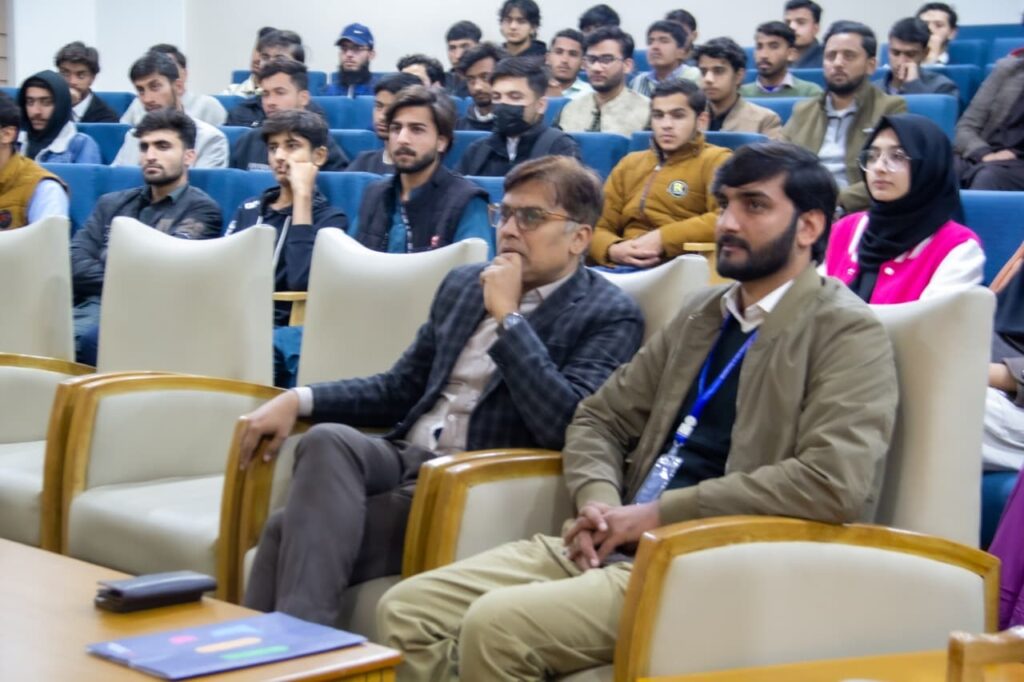 Dr. Amad-ud-Din and Mr. Muhammad Adil during the address by NSTP Deputy Director