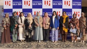 Principal and faculty representatives from different colleges during a collaborative academic gathering at University of Rawalpindi