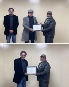 Add'l registrar of UOR awarding certificates to Salman Shehzad, Project Director NFLP-Y, and Dr. Abdul Ghaffar Khan