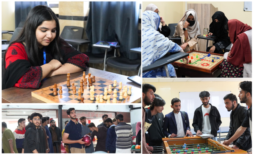 Students playing indoor sports during a university sports activity at University of Rawalpindi.